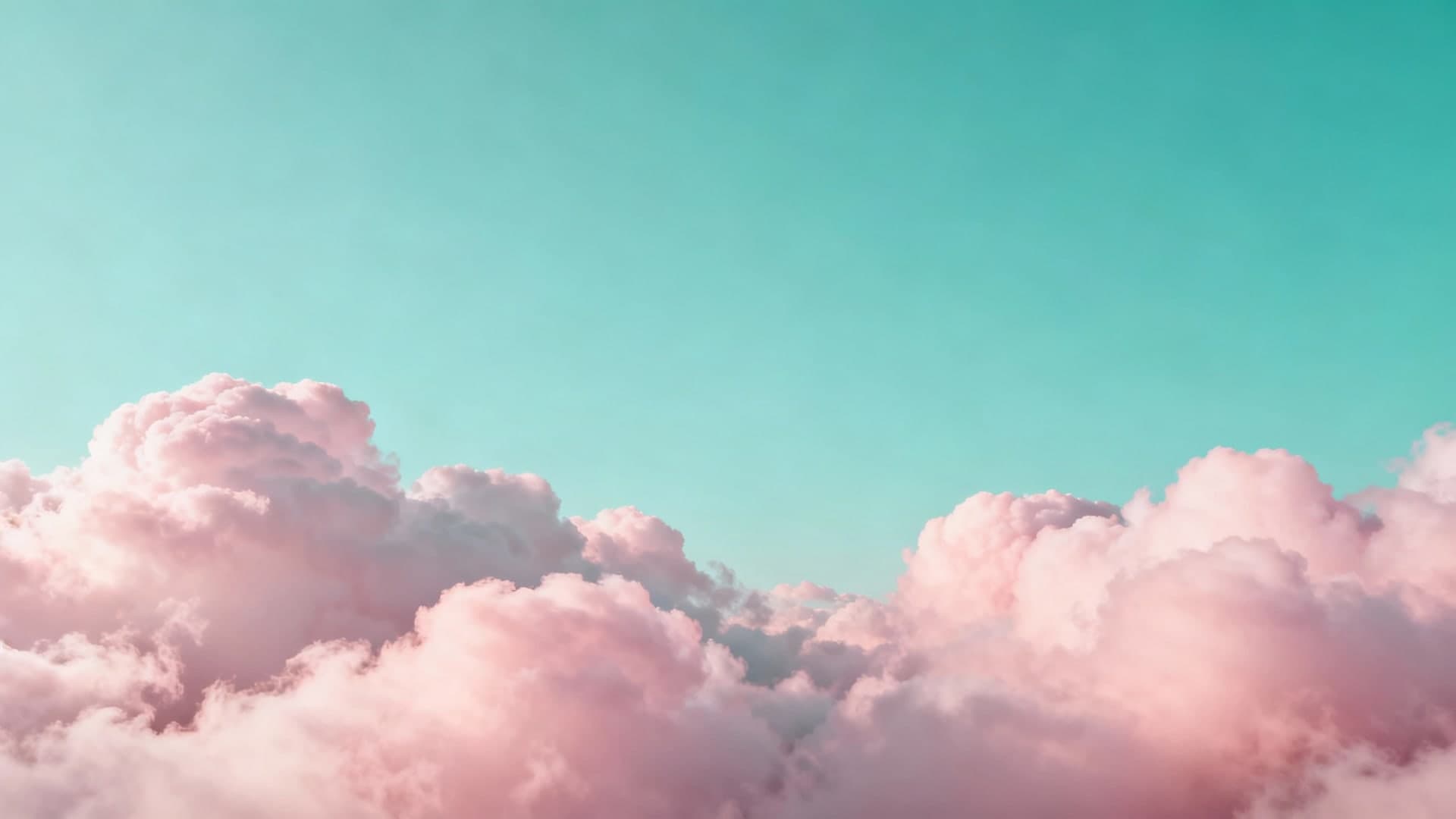 soft cotton-like pink clouds under a pastel sky